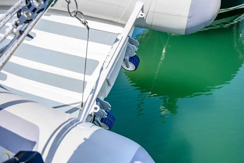 Slide: The Image of Close-up of Nord Star 28 Patrol boat's inflatable section and water reflection, 2019 model. - 15