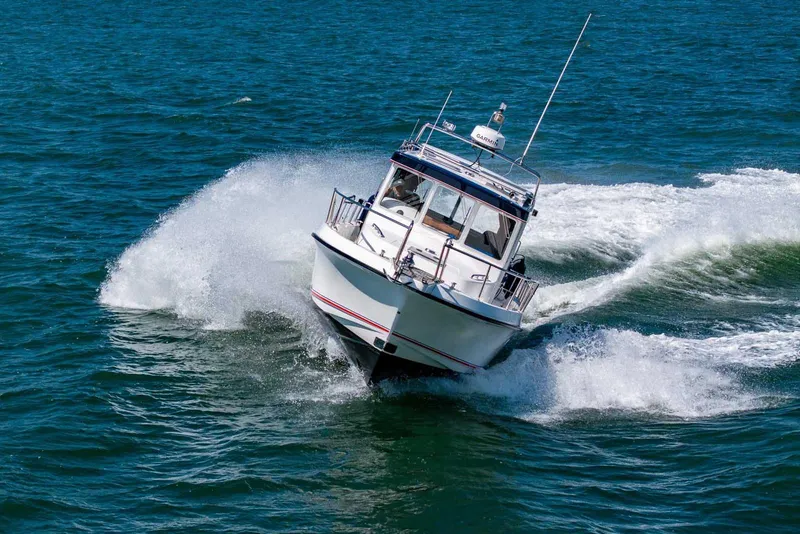 Slide: The Image of 2019 Nord Star 28 Patrol boat navigating through ocean waves. - 4