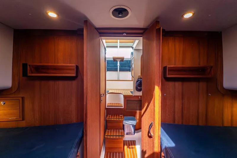 Slide: The Image of Interior of 2019 Nord Star 28 Patrol boat with wooden finishes and cozy cabin. - 42