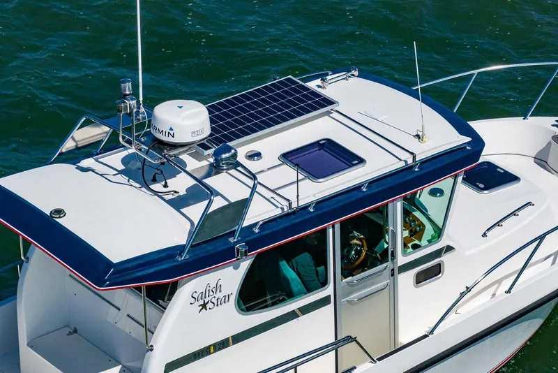 Slide: The Image of Nord Star 28 Patrol 2019 boat with solar panel and Garmin radar on roof. - 8