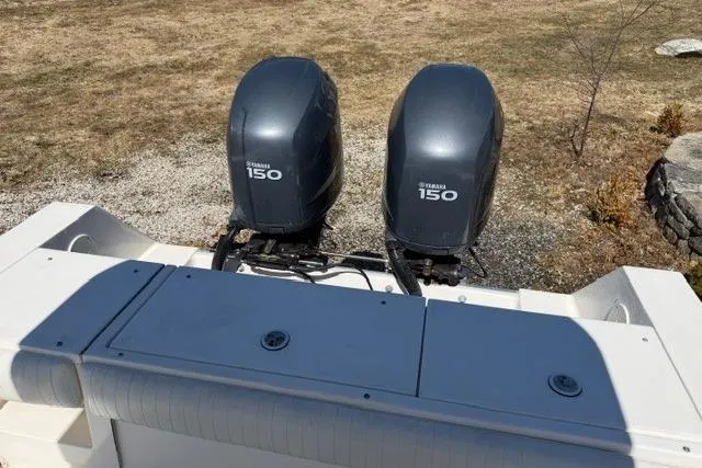 Slide: The Image of 2004 Regulator 24 Forward Seating boat with twin Yamaha 150 engines. - 9