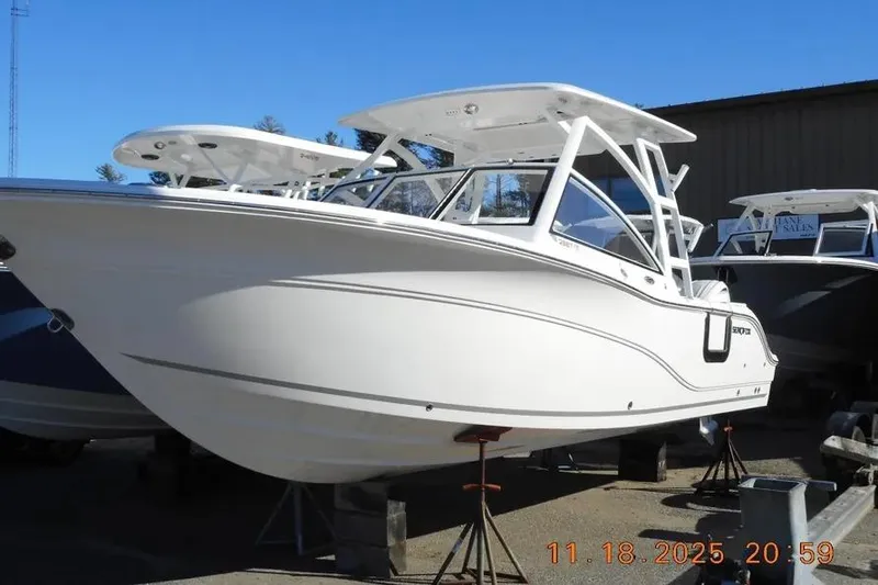 The Image of 2026 Sea Fox 268 Traveler boat displayed outdoors on stands. - 1