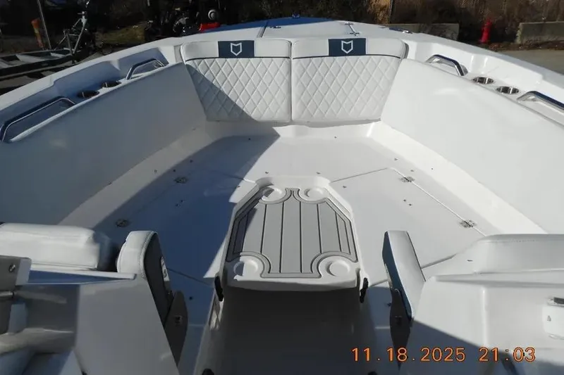 Slide: The Image of Interior view of 2026 Sea Fox 268 Traveler boat with white seating and table. - 18