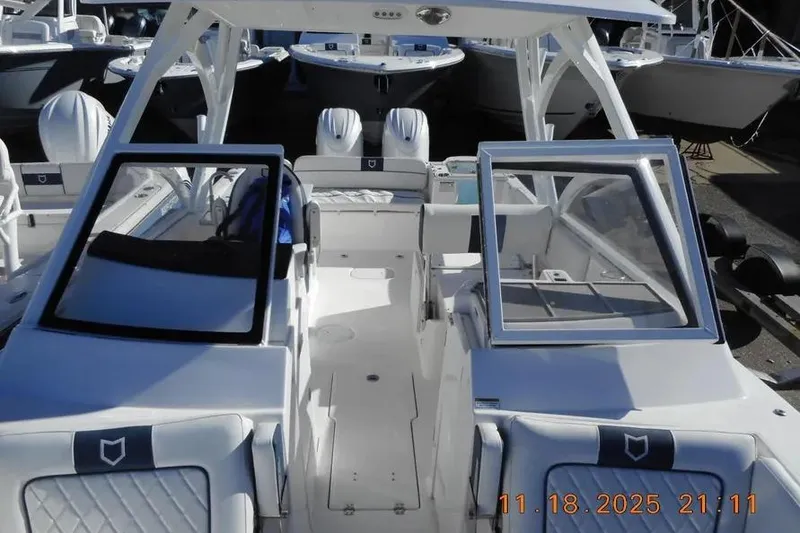 Slide: The Image of 2026 Sea Fox 268 Traveler boat interior with open windshield and seating. - 26