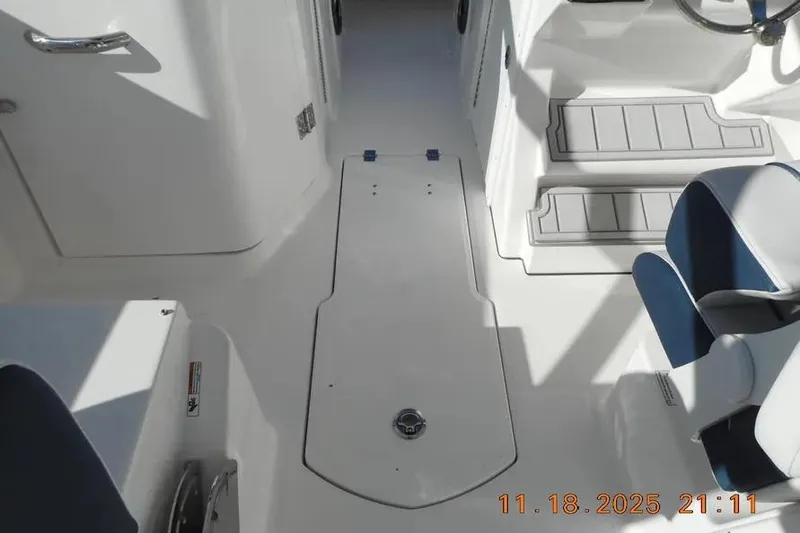 Slide: The Image of Interior view of 2026 Sea Fox 268 Traveler boat, featuring seating and deck layout. - 27