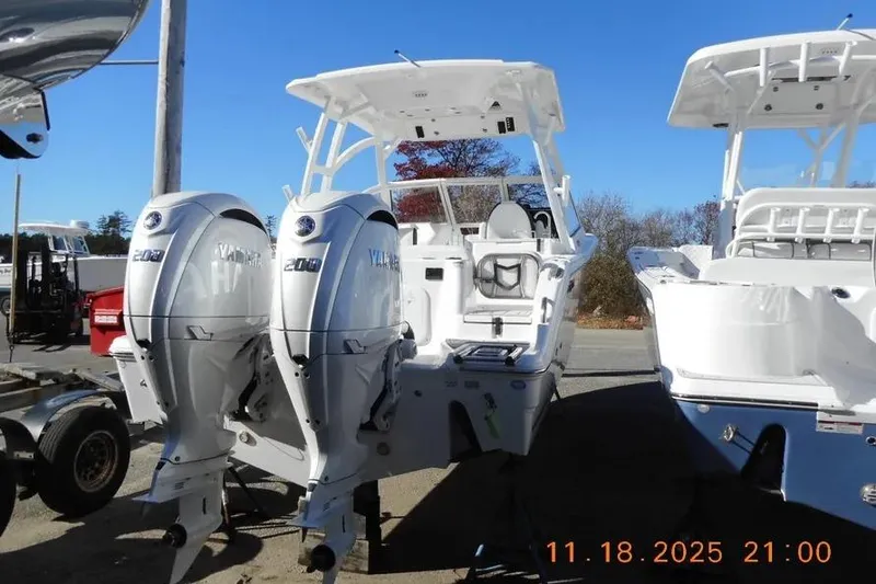 Slide: The Image of 2026 Sea Fox 268 Traveler boat with dual Yamaha engines, displayed outdoors. - 4