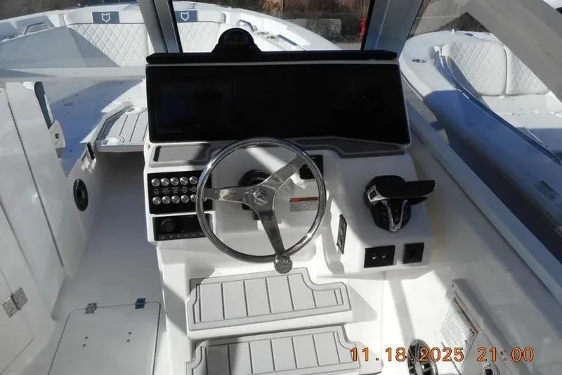 Slide: The Image of Helm of 2026 Sea Fox 268 Traveler boat with steering wheel and controls. - 6