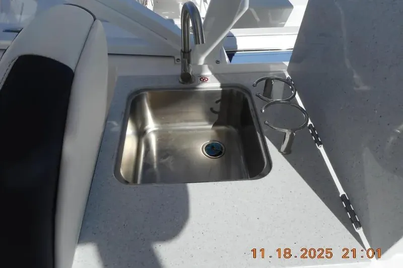 Slide: The Image of Stainless steel sink on 2026 Sea Fox 268 Traveler boat with cup holders. - 9