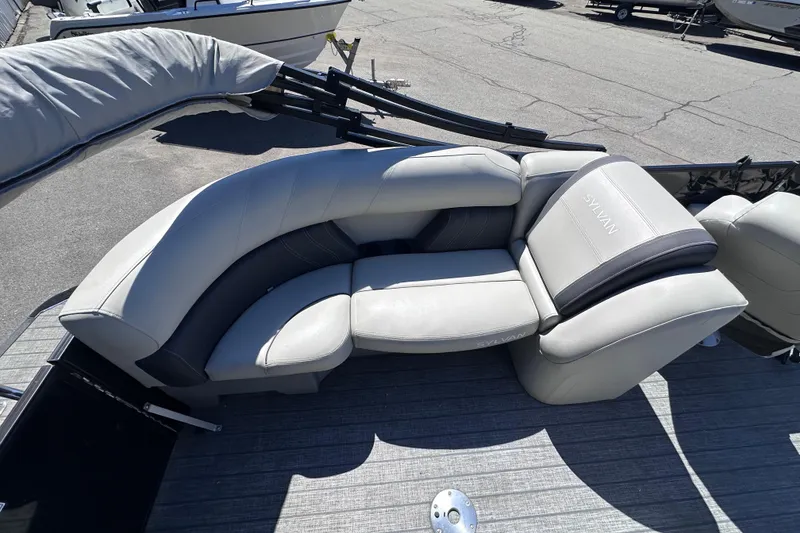 Slide: The Image of Luxurious seating on 2021 Sylvan Mirage X X3 pontoon boat, featuring elegant upholstery. - 8
