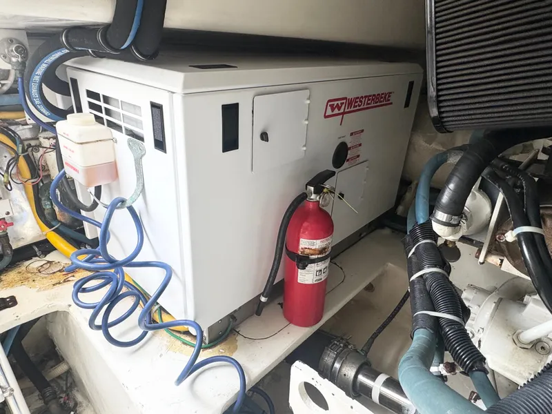 Slide: The Image of Engine room of 2008 Ocean Yachts 58 Super Sport with Westerbeke generator. - 30