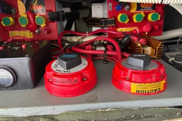 Slide: The Image of Electrical components and wiring inside a 1993 Sea Ray Sundancer 330 boat. - 109