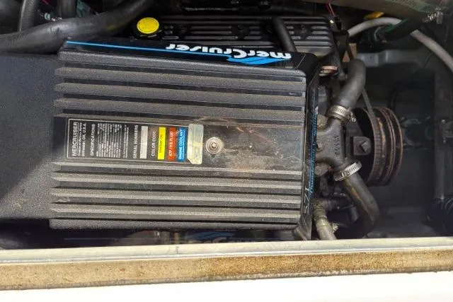 Slide: The Image of Engine compartment of a 1993 Sea Ray Sundancer 330 with MerCruiser components. - 115