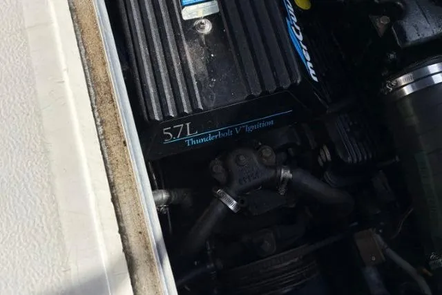 Slide: The Image of Engine compartment of 1993 Sea Ray Sundancer 330 with 5.7L Thunderbolt V Ignition. - 116
