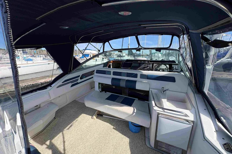 Slide: The Image of Interior view of 1993 Sea Ray Sundancer 330 boat with seating and helm. - 20