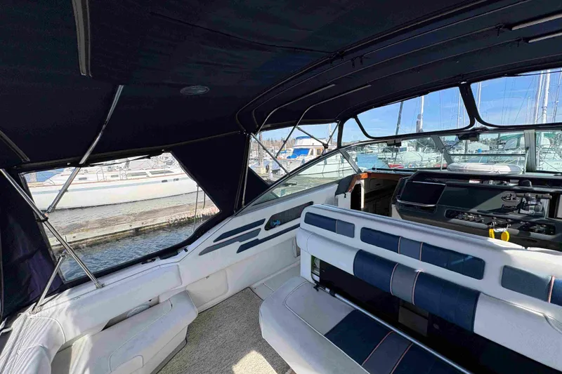 Slide: The Image of Interior view of 1993 Sea Ray Sundancer 330 yacht at marina. - 36
