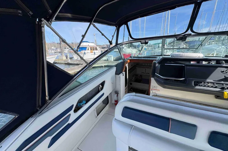 Slide: The Image of Interior view of 1993 Sea Ray Sundancer 330 boat at marina. - 42