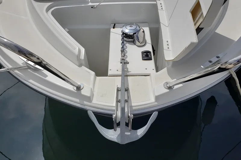 Slide: The Image of 2019 Beneteau Antares 23 boat anchor system with chain and winch. - 12