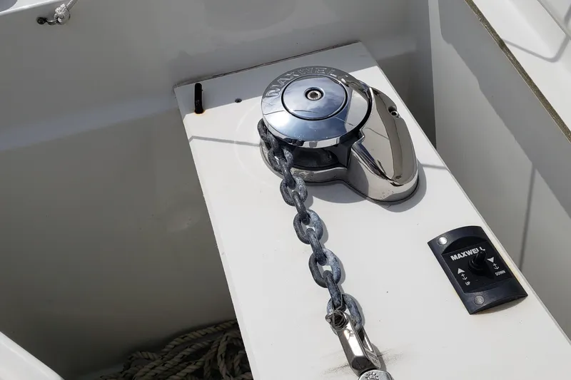 Slide: The Image of Windlass and chain on a 2019 Beneteau Antares 23 boat deck. - 13