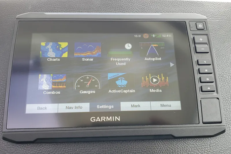Slide: The Image of Garmin marine navigation display on 2019 Beneteau Antares 23 boat dashboard. - 24