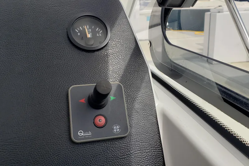 Slide: The Image of Control panel of a 2019 Beneteau Antares 23 boat with gauge and joystick. - 27