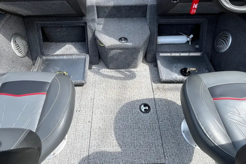 Slide: The Image of Interior of 2022 Tracker Pro Guide V-175 WT boat with seating and storage compartments. - 17