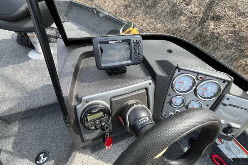 Slide: The Image of 2022 Tracker Pro Guide V-175 WT dashboard with Lowrance fishfinder and gauges. - 18