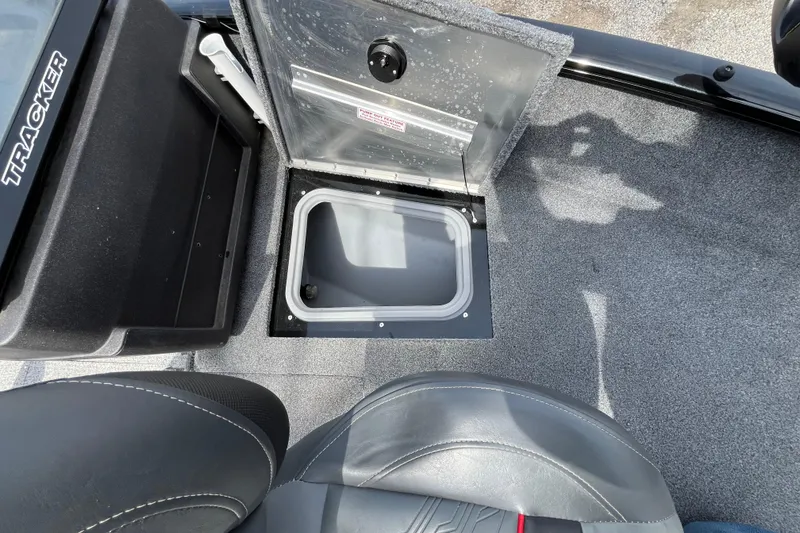 Slide: The Image of 2022 Tracker Pro Guide V-175 WT boat interior with open storage compartment. - 21