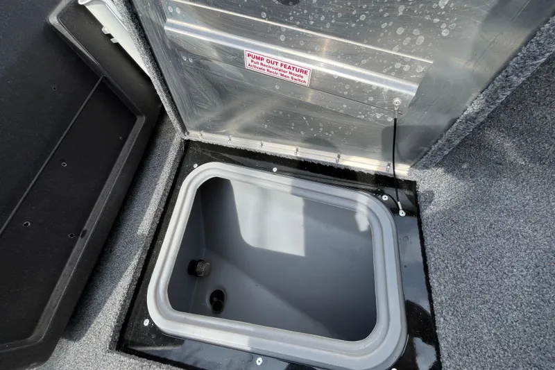 Slide: The Image of 2022 Tracker Pro Guide V-175 WT boat storage compartment with pump-out feature. - 22