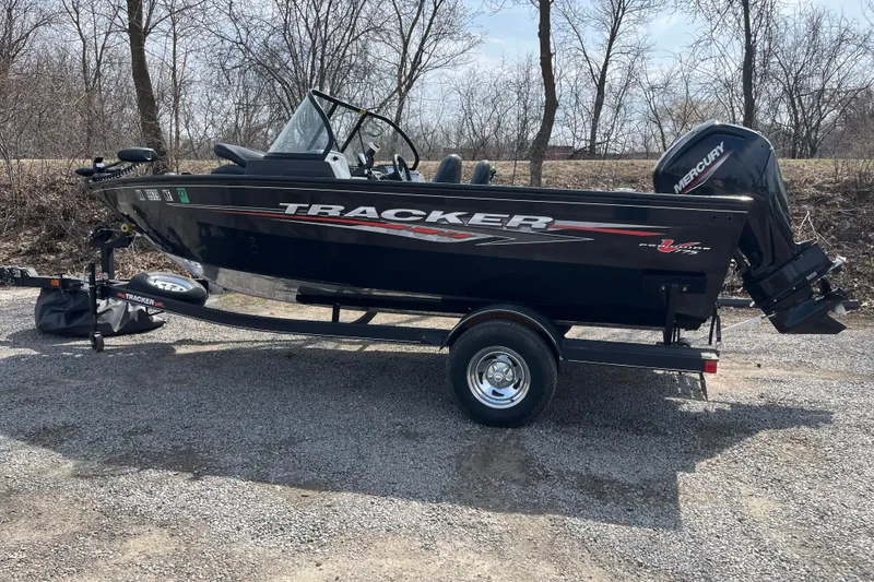 Slide: The Image of 2022 Tracker Pro Guide V-175 WT boat on trailer, parked outdoors. - 3