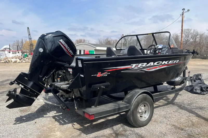 Slide: The Image of 2022 Tracker Pro Guide V-175 WT boat with Mercury engine on trailer. - 4