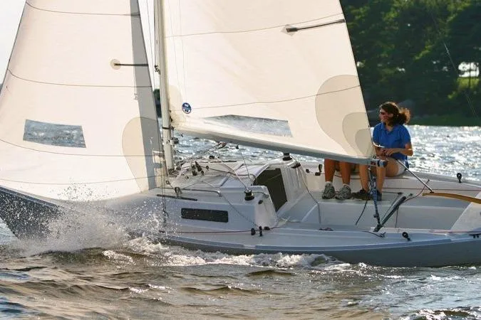 The Image of Sailing a 1988 J Boats J/22 on a sunny day with white sails and choppy waters. - 0