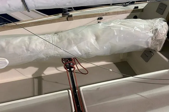 Slide: The Image of 1988 J Boats J/22 sailboat interior with wrapped sail and rigging. - 4