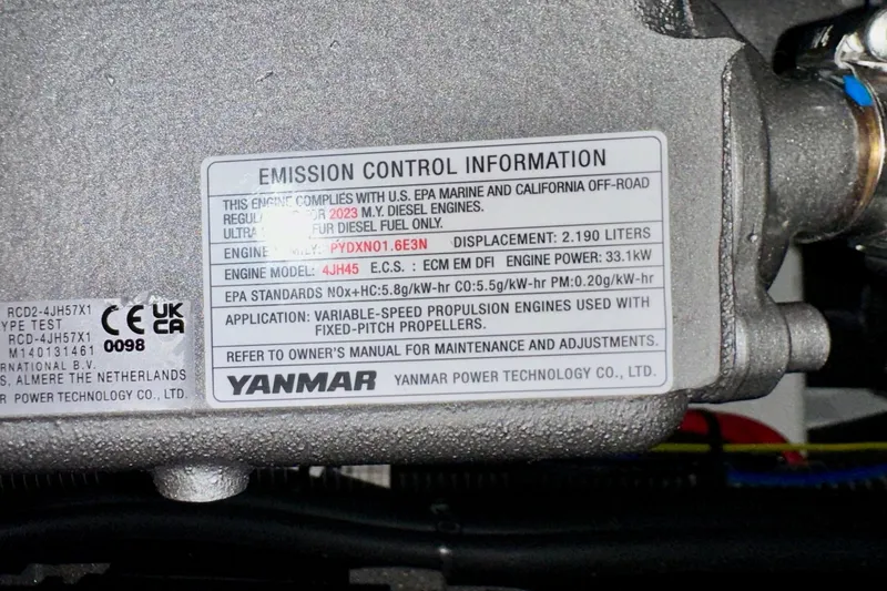 Slide: The Image of Emission control label on Yanmar engine for Jeanneau Sun Odyssey 410, 2024 model. - 100