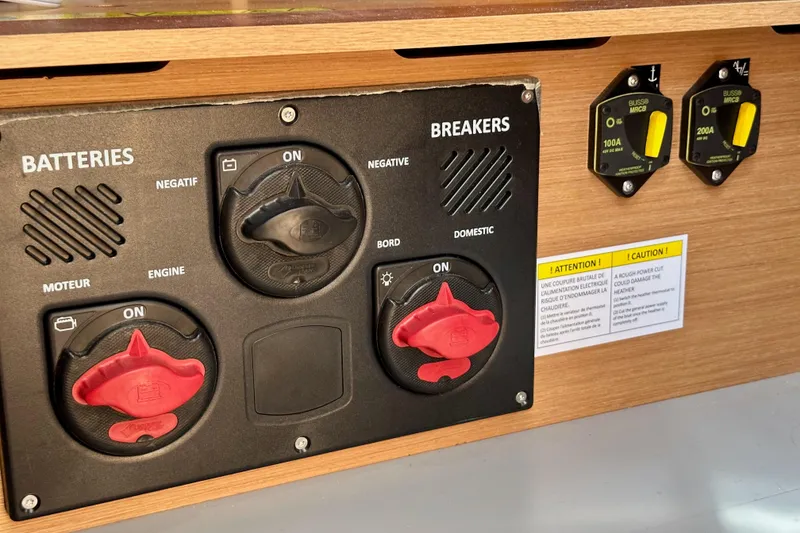 Slide: The Image of Battery and breaker panel on 2024 Jeanneau Sun Odyssey 410 sailboat. - 102