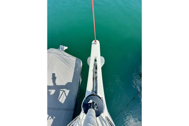 Slide: The Image of Overhead view of Jeanneau Sun Odyssey 410 yacht bow, 2024 model, on calm water. - 36