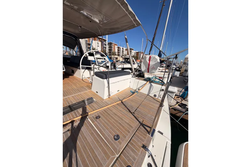 Slide: The Image of Beneteau Oceanis Yacht 60, 2015 model, featuring a spacious deck and modern design. - 26