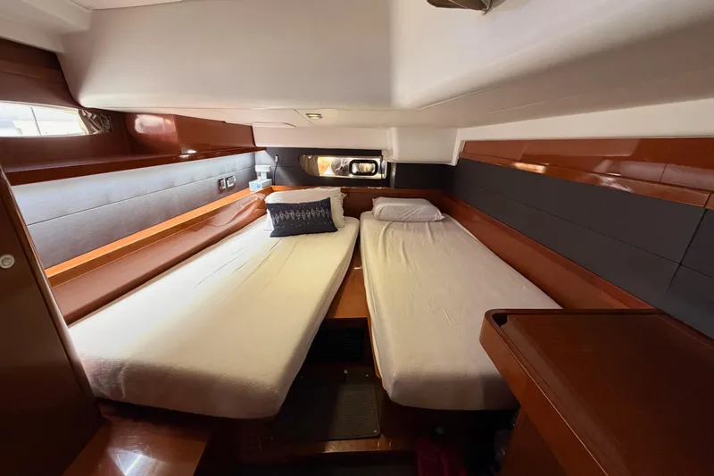 Slide: The Image of Luxurious cabin interior of 2015 Beneteau Oceanis Yacht 60 with twin beds. - 64