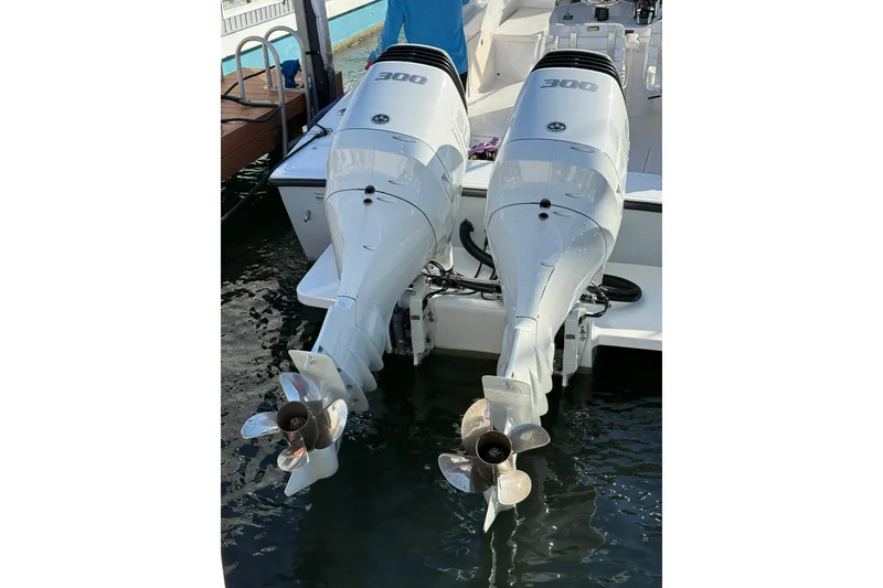 Slide: The Image of Twin outboard motors on a boat, Salt Shaker 300 model, 1990. - 13