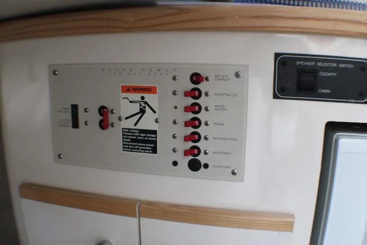 Slide: The Image of Control panel of a 1998 Bayliner 2655 Ciera Sunbridge boat with warning label. - 24