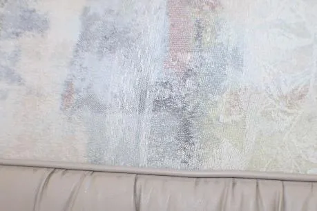 Slide: The Image of Interior detail of 1998 Bayliner 2655 Ciera Sunbridge with textured wall and beige upholstery. - 60