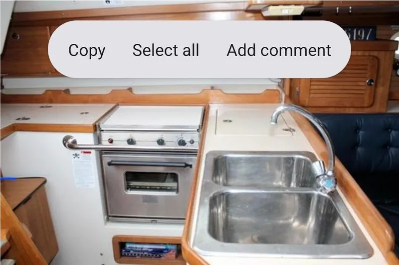Slide: The Image of Interior of 2001 Catalina 36 MkII yacht kitchen with stove and double sink. - 4