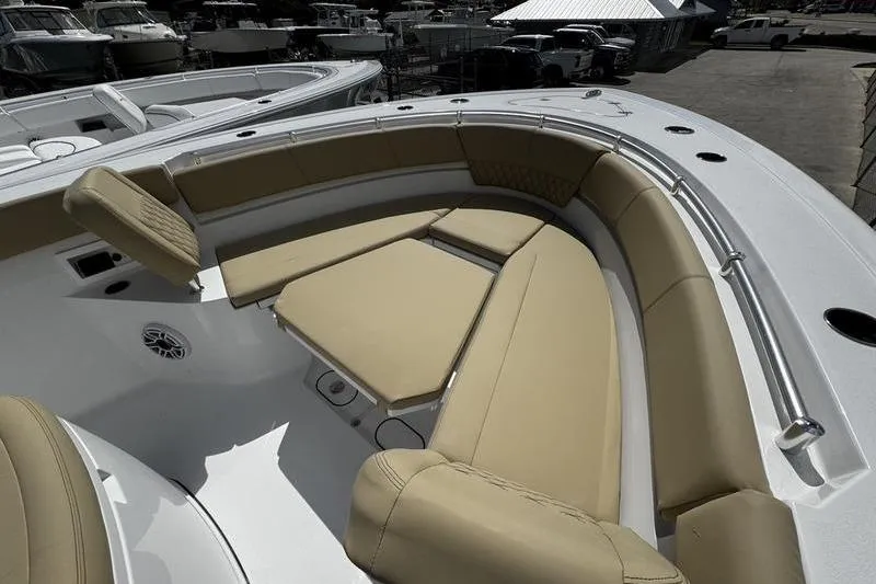 Slide: The Image of 2026 Sportsman Heritage 321 Center Console boat deck, featuring sleek design and modern fittings. - 1