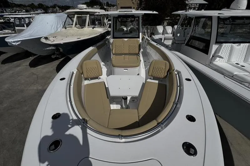 Slide: The Image of Interior of 2026 Sportsman Heritage 321 Center Console with sleek wood cabinetry. - 17