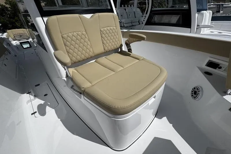 Slide: The Image of Interior of 2026 Sportsman Heritage 321 Center Console boat with modern amenities. - 18