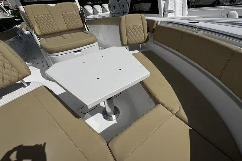 Slide: The Image of Interior view of 2026 Sportsman Heritage 321 Center Console boat, featuring sleek design and amenities. - 19