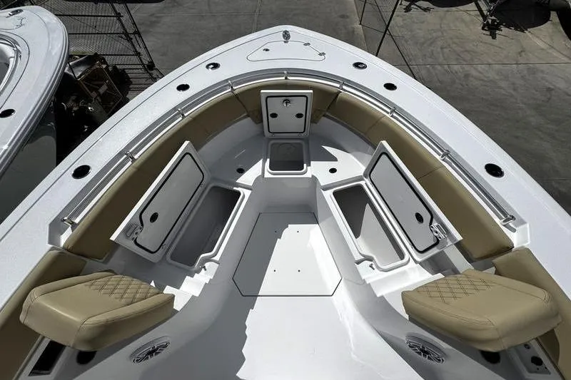 Slide: The Image of Interior of 2026 Sportsman Heritage 321 Center Console boat with modern cabinetry. - 20