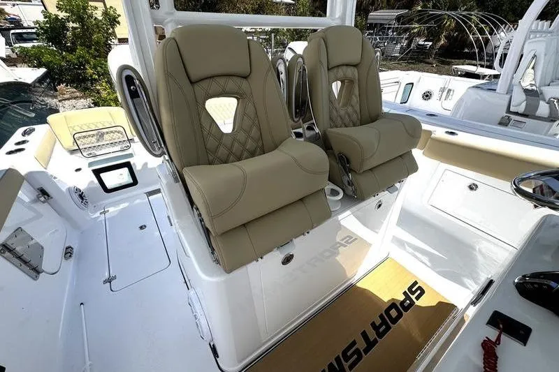 Slide: The Image of 2026 Sportsman Heritage 321 Center Console interior with seating and storage compartments. - 38