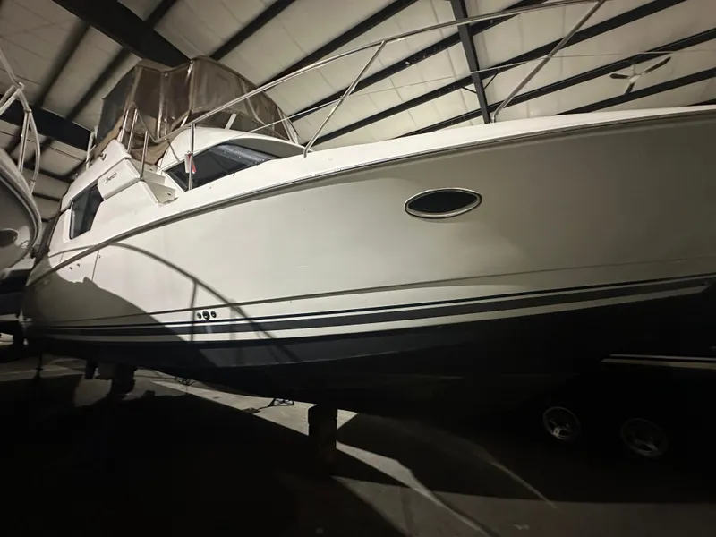 The Image of 1998 Silverton 351 Sedan Yacht in a storage facility. - 0