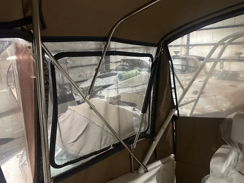 Slide: The Image of Interior view of a 1998 Silverton 351 Sedan boat canopy. - 10