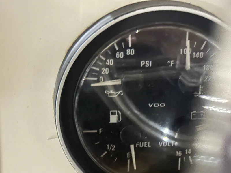 Slide: The Image of Close-up of a VDO gauge in a 1998 Silverton 351 Sedan. - 13